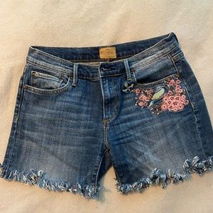 Cut off DRIFTWOOD embroidered denim shorts.  Size 27